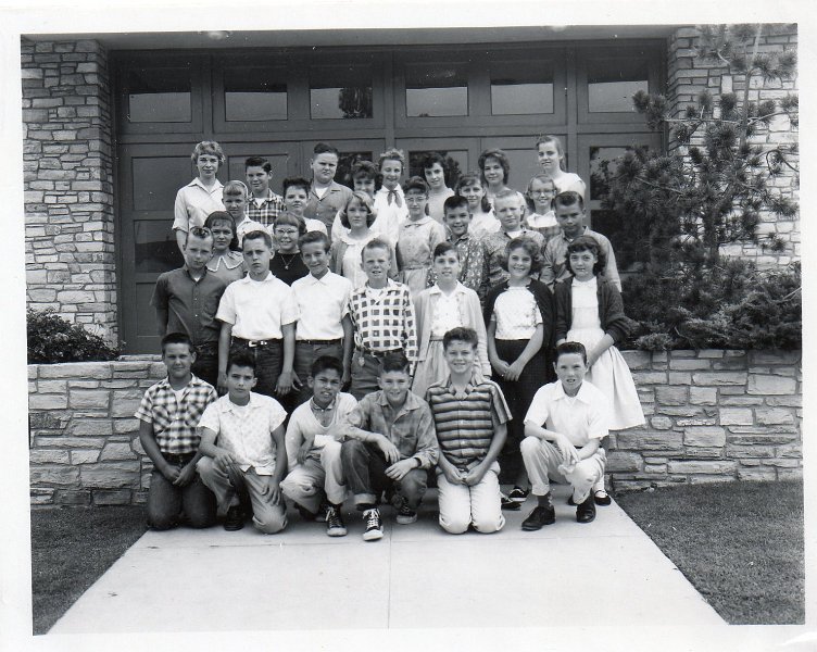 Rick_6th_Grade_Class.jpg - 6th grade class photo ('59-'60). I tried to remember the names of most of the students in the pic. (7 in)Back row, left to right: (Teacher) Miss Goodart, then married during school year and was Mrs. Carroll / Rick Massey / Robert Fernac / Carol ??? - played the accordion / Shirley Akowski - bumped me out of the top of the alphabetical top spot / Linda Podalak - she liked peanut butter & pickle relish sandwiches / & (Steve Stovall help me here) our neighbor down the street 'something' Williams.Row 2 - (5) 1st girl ??? / Darlene White / girl half-hidden ? / girl w/bangs ? (wish I could remember!) / Susan something or Marilyn Fox?Row 3 - (7) Linda? / Diane Stilley? / Beth Ellsworth / Carolyn Hotze / Tim? - guy w/short dark hair / Larry? - guy w/short light hair / Jim Atchitson (sp?)Row 4 - (7) John Moriarity / 2nd guy? / Harold Coast / Larry? - checkered shirt / Dolly Thomas - & actually had quite the 'doll' collection / Charlott Manning / Rhonda Cox?Row 5 - Kenny Lunny (sp?) / Steve Ewell / Me / Pat Murphy / Jacob Clausen / Bob O'Brien?